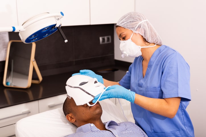 Black Male Getting Light Skin Therapy