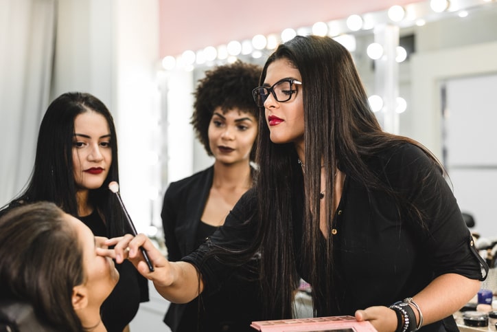 Class Learning how to be a makeup artist