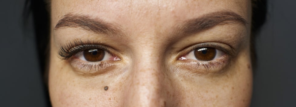 Woman With One Eye That Has Eyelash Extensions