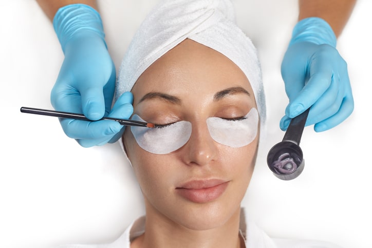 Woman Getting Eyelashes Tinted