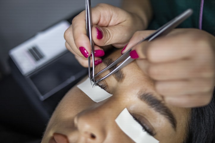 Lash Tech Applying Eyelash Extensions