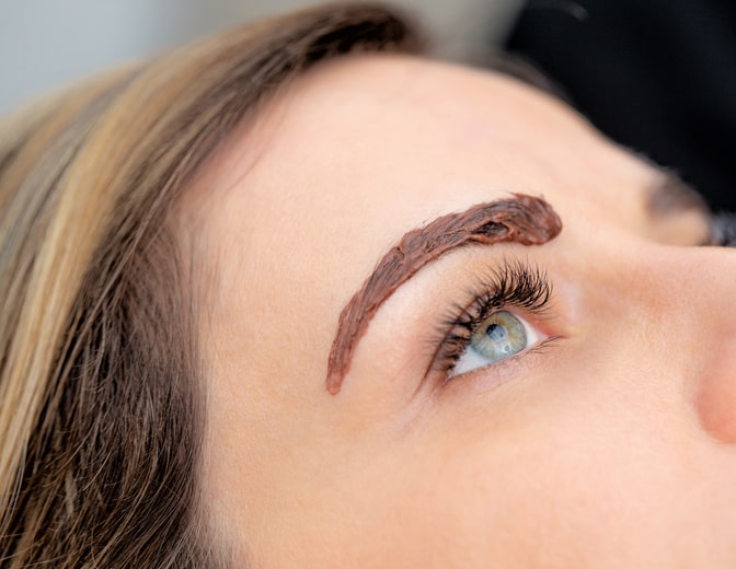 Woman Getting Eyebrows Tinted