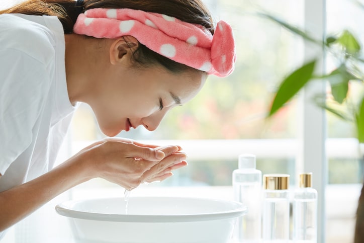 Woman Washing Her Face