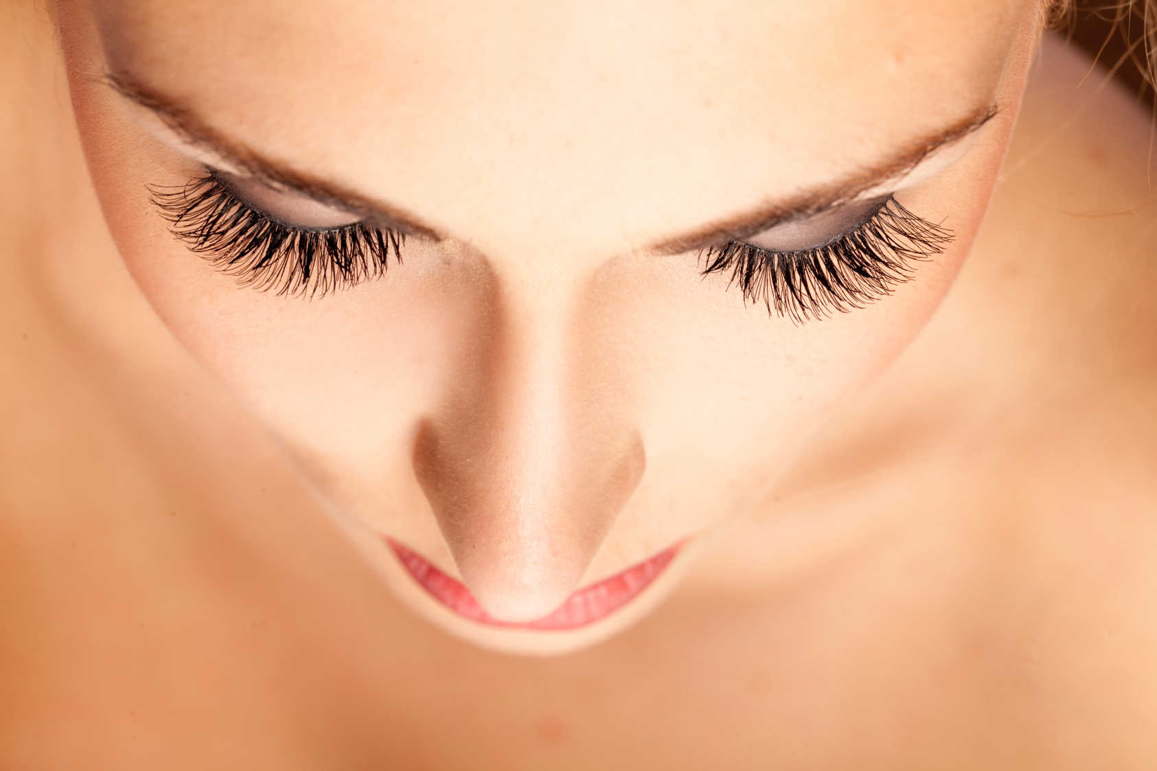 Woman wearing fake eyelashes