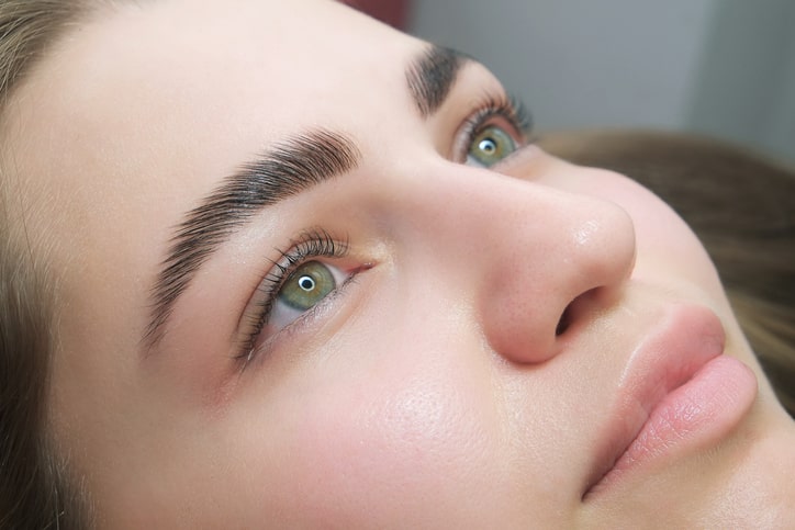 Woman with finished brow lamination