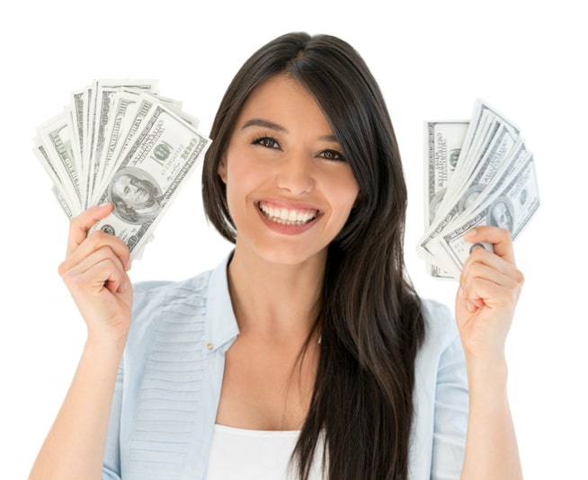 Woman holding money from beauty salon