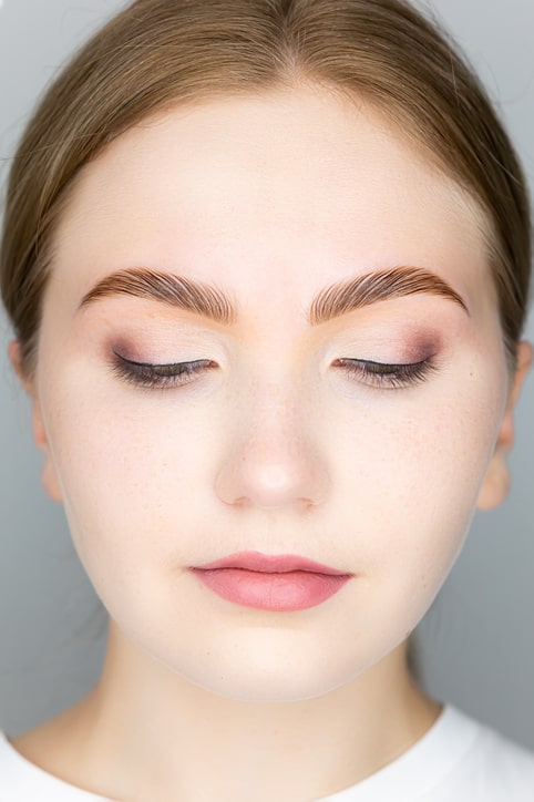 Woman with perfect brow lamination